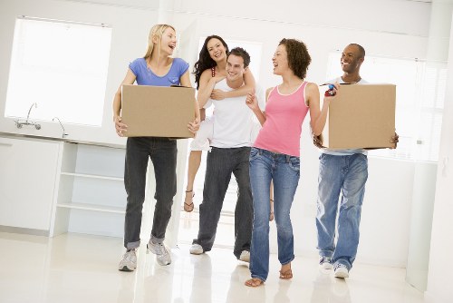 Moving home in Bromley with boxes and removal van