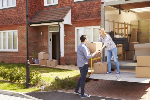 Movers navigating access and parking challenges on a Bromley street
