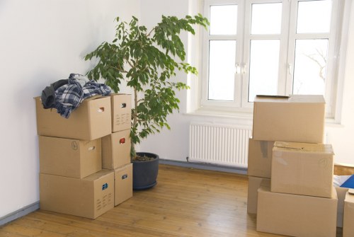 Movers handling furniture and boxes during a Bromley house move