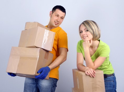 Loading furniture into a removal truck