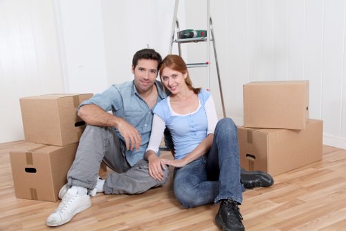Packed boxes and furniture in a Bromley flat move