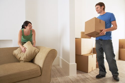 Organised workplace move with labelled boxes and furniture dismantling